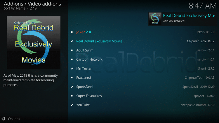 Wait a minute or two for the Real-Debrid Exclusively Movies Kodi add-on to install