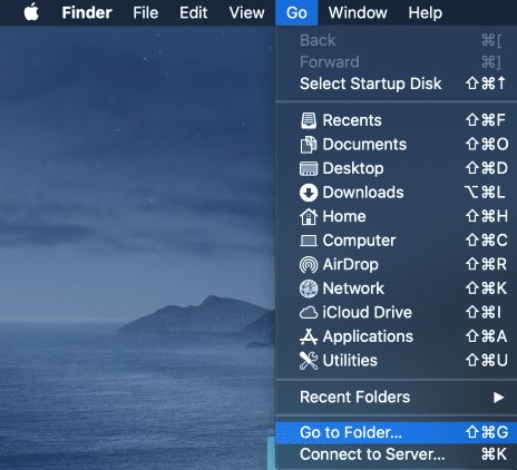 On the desktop of your Mac hover over the Go option in the upper menu and click Go to Folder.