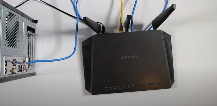 In this example, I am directly connected to my computer's ethernet port into one of the LAN ports (local area network) on the back of the router