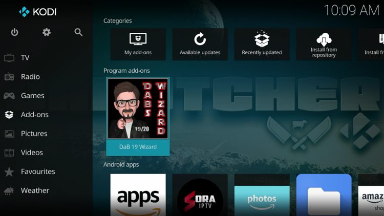 Return back to the home screen of Kodi, hover over Add-ons and click DaB Wizard under Program add-ons.