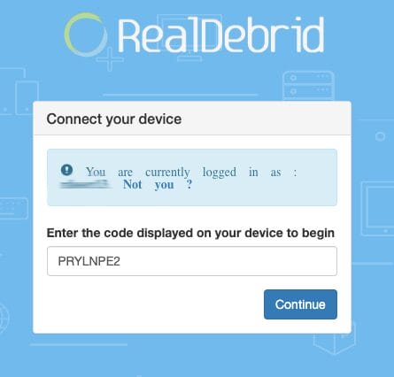 Visit real-debrid.com/device and enter the provided code.