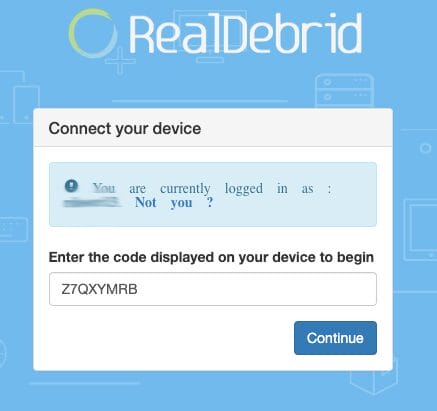 Visit real-debrid.com/device and enter the provided code.