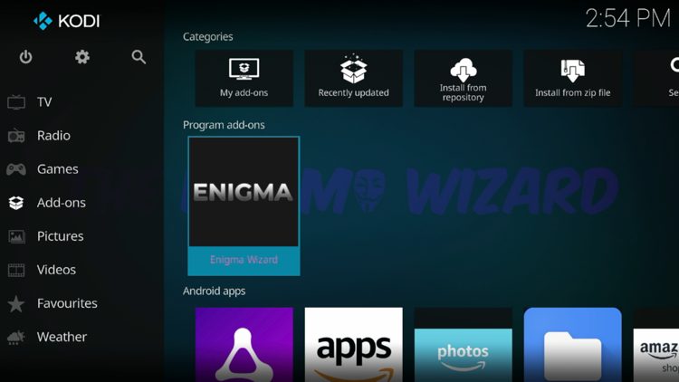 Return back to the home screen of Kodi, hover over Add-ons and click the Enigma Wizard under Program add-ons.