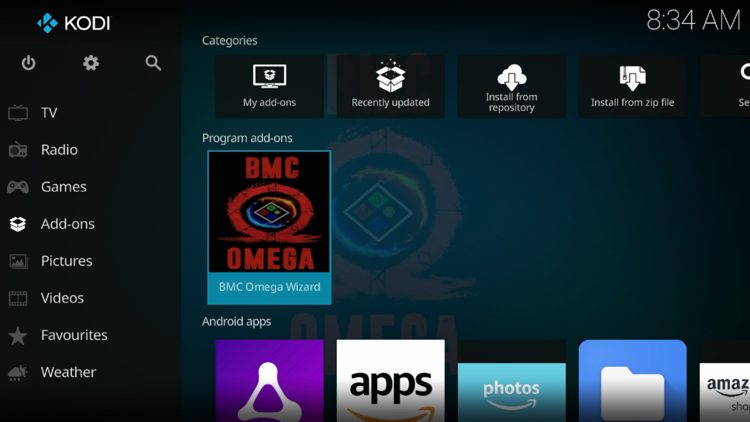 Return back to the home screen of Kodi, hover over Add-ons and click The BMC Omega Wizard under Program add-ons.