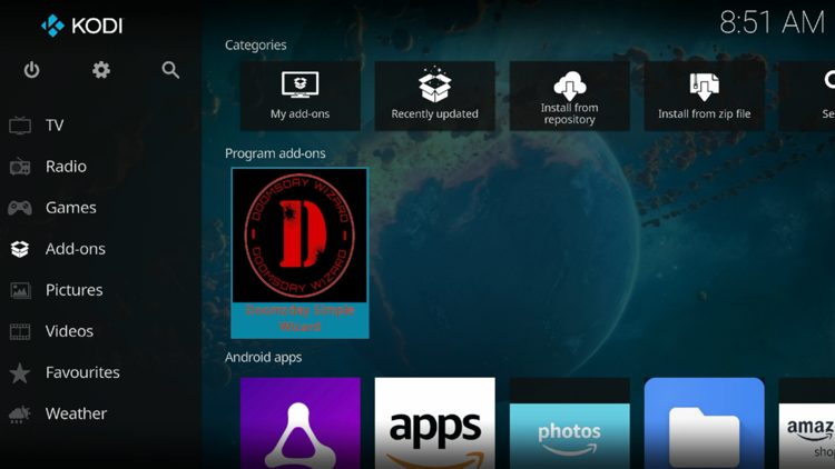 Return back to the home screen of Kodi, hover over Add-ons and click Doomzday Simple Wizard under Program add-ons.