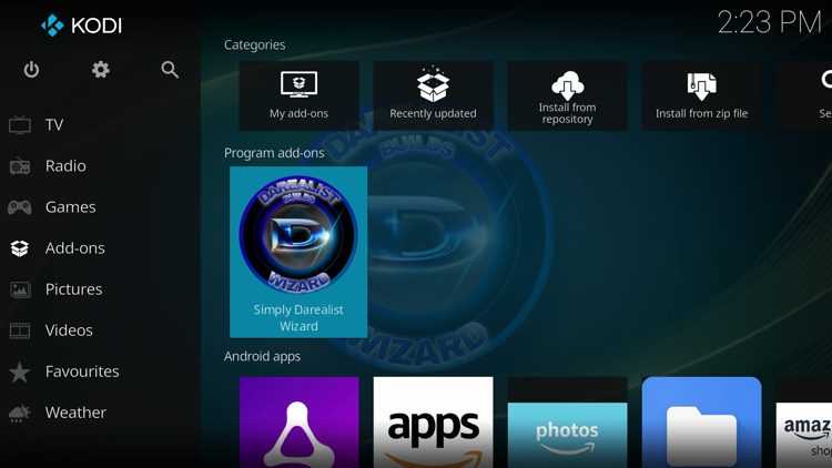 Return back to the home screen of Kodi, hover over Add-ons and click Simply Darealist Wizard under Program add-ons.