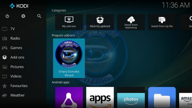Return back to the home screen of Kodi, hover over Add-ons and click Simply Darealist Wizard under Program add-ons.
