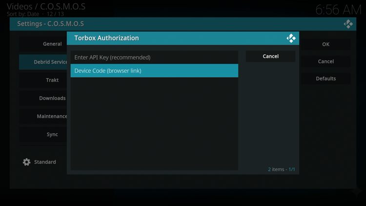 You can choose to authorize TorBox with a device code or by entering your API key.